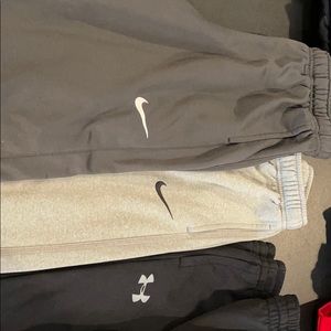 FIVE pairs of boys LARGE athletic pants. Size L